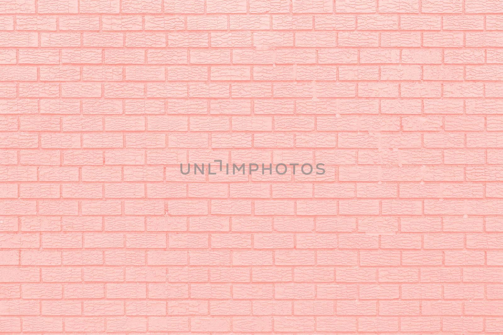 Brick wall texture background. Image in trendy living coral color