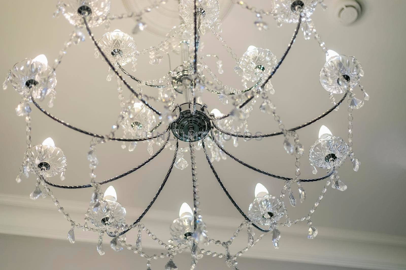 Luxurious crystal chandelier, candle-shaped lamps. by Yurich32