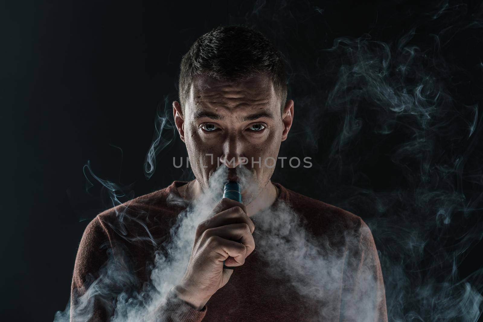 man smokes vape smoke Electronics vaping nicotine by SHOTPRIME