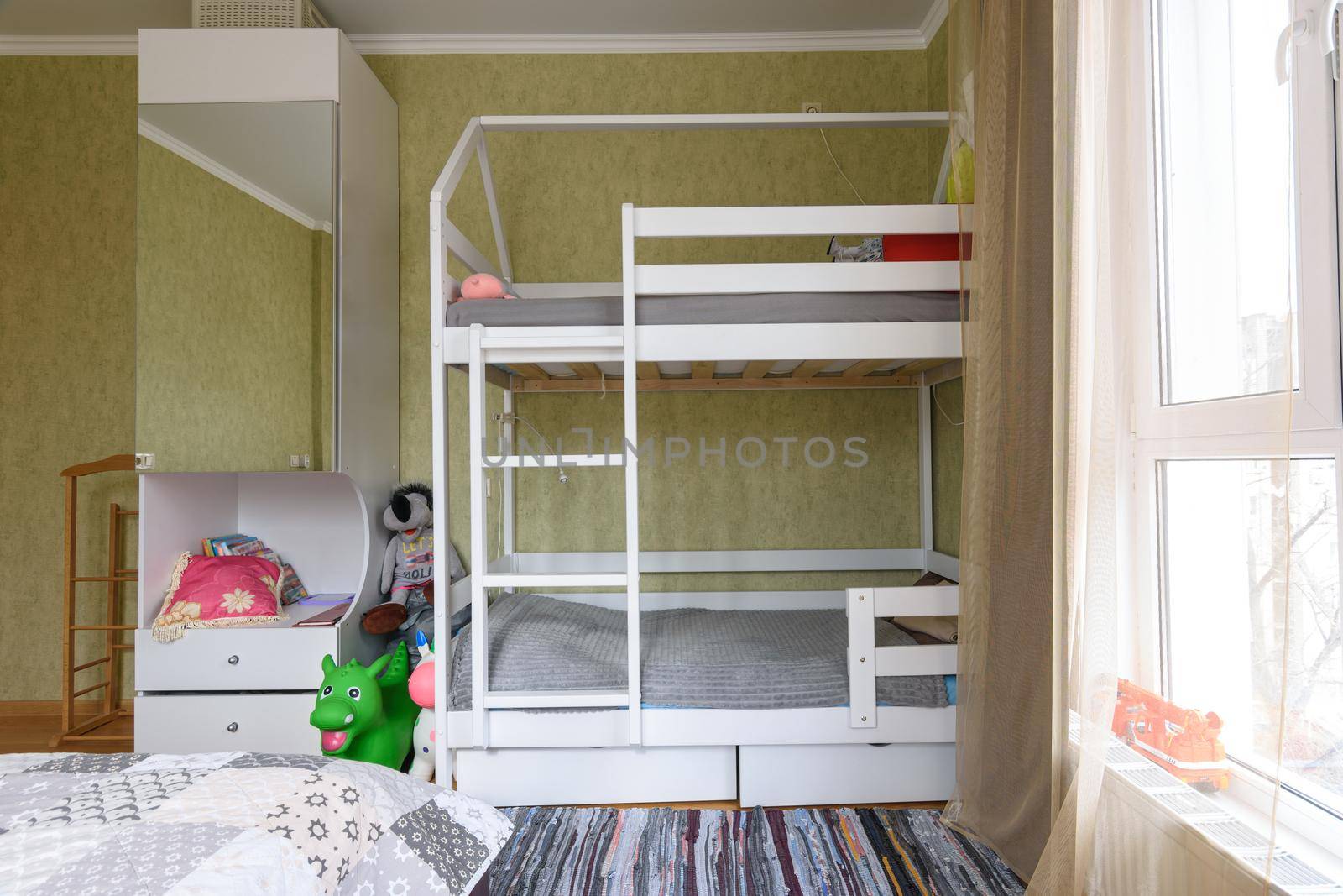 Bedroom interior with large children's bunk bed by Madhourse