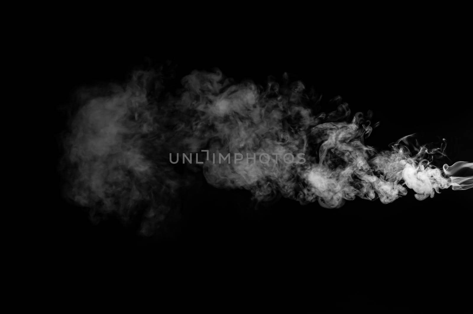 White smoke isolated on black background by thanumporn