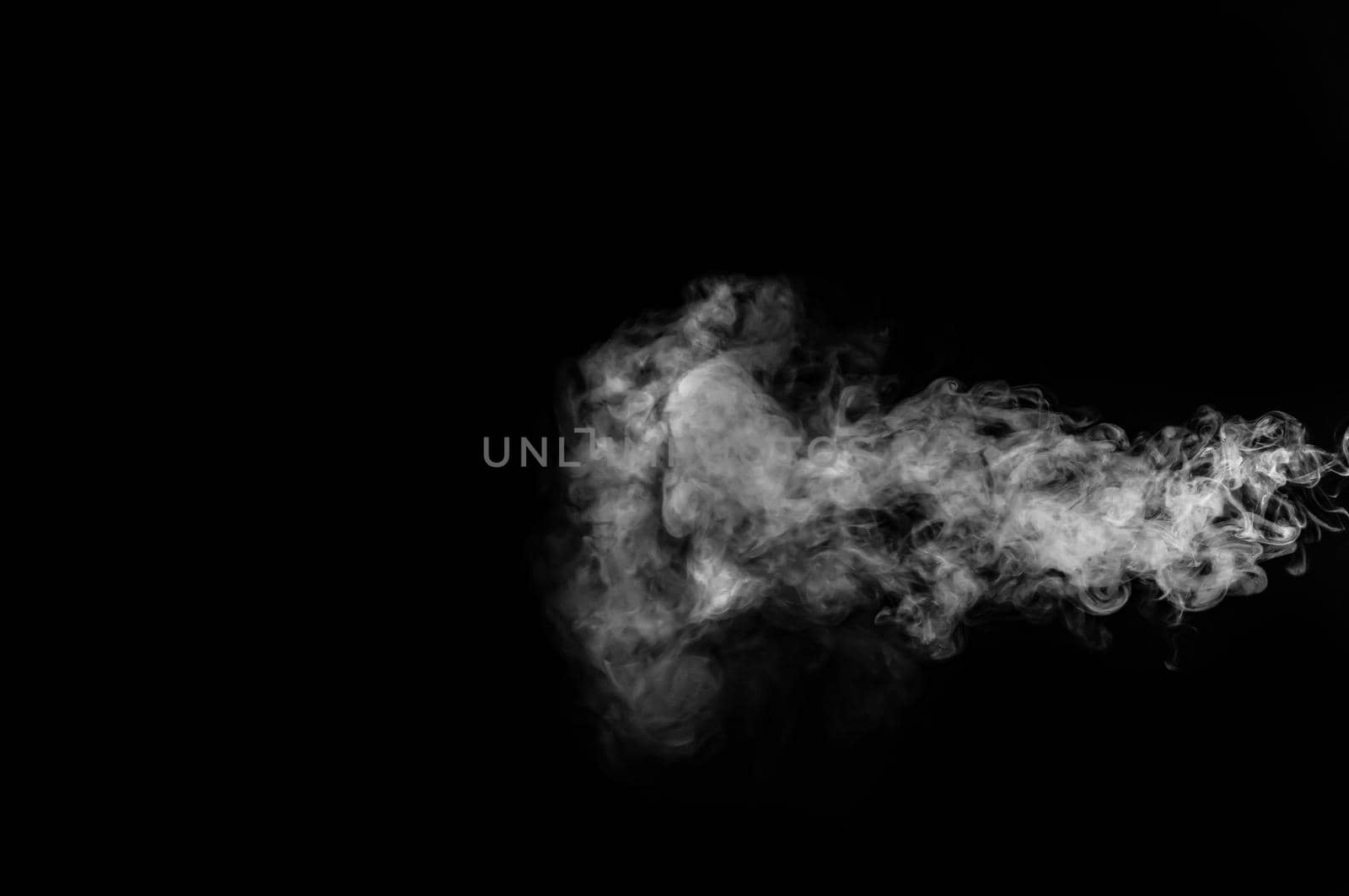 White smoke isolated on black background by thanumporn