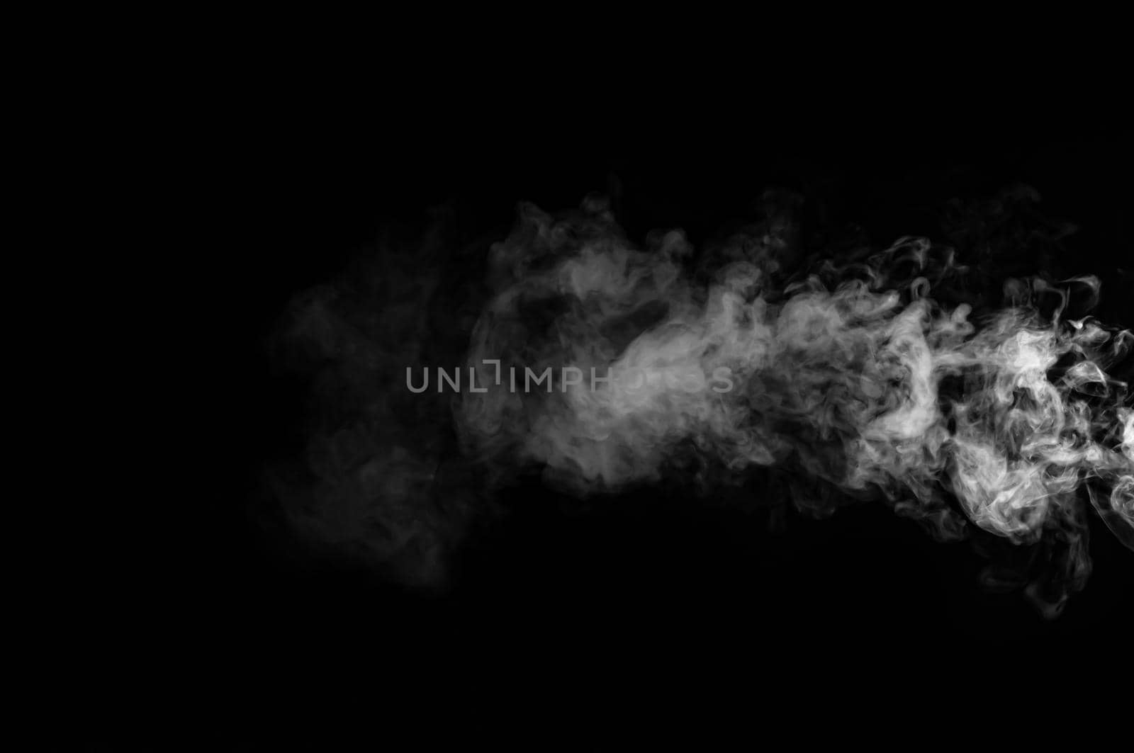 White smoke isolated on black background by thanumporn