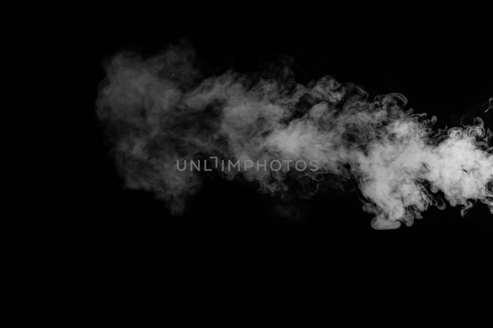 White smoke isolated on black background by thanumporn