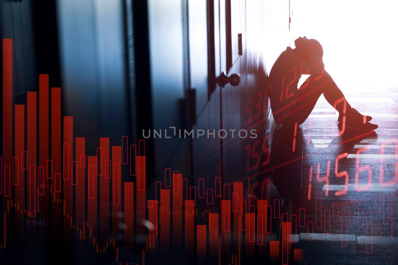Tired or stressed businessman sitting on the walkway in panic digital stock market financial background.