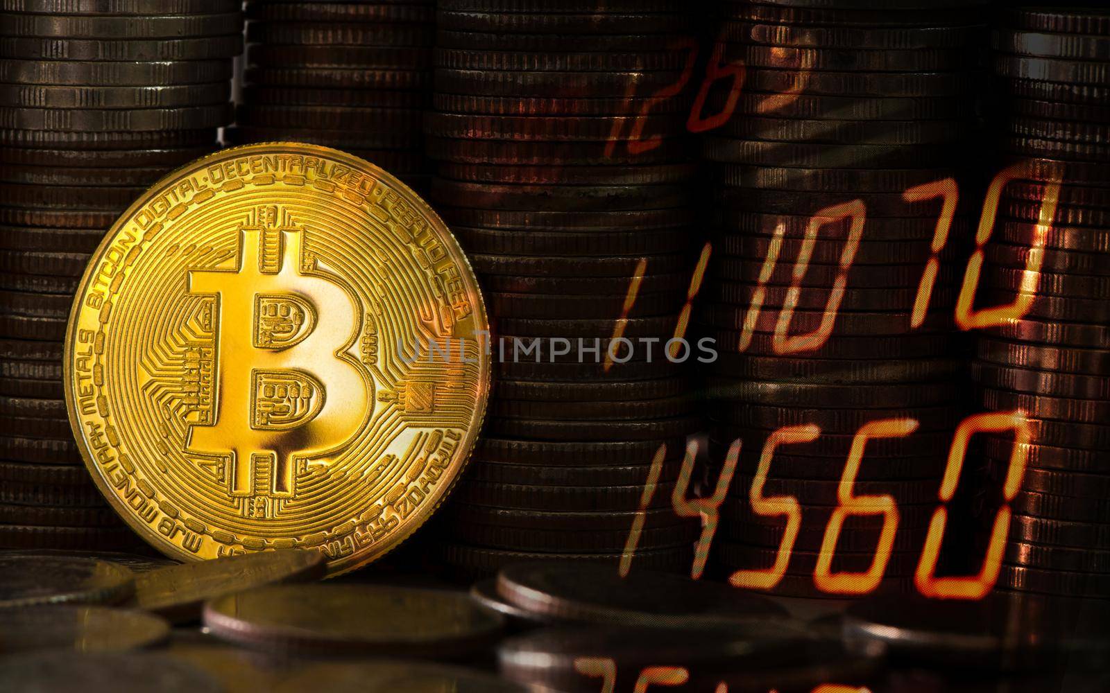 Close-up bitcoin on the background of coins of baht. Stocks Exchange Market Graph Concept. by thanumporn