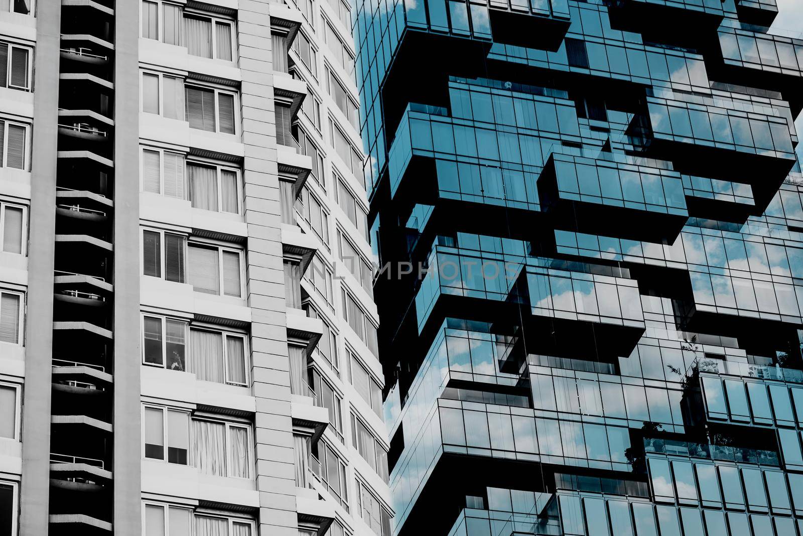 Modern office building and apartment facade. by thanumporn