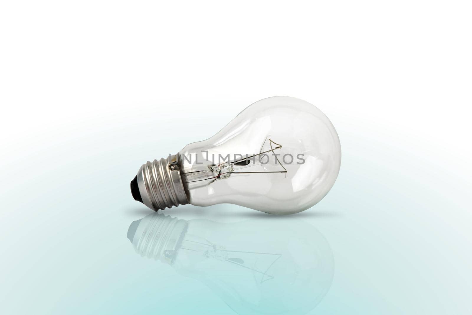 Light bulbs on blue color background. Flat lay. Pattern.