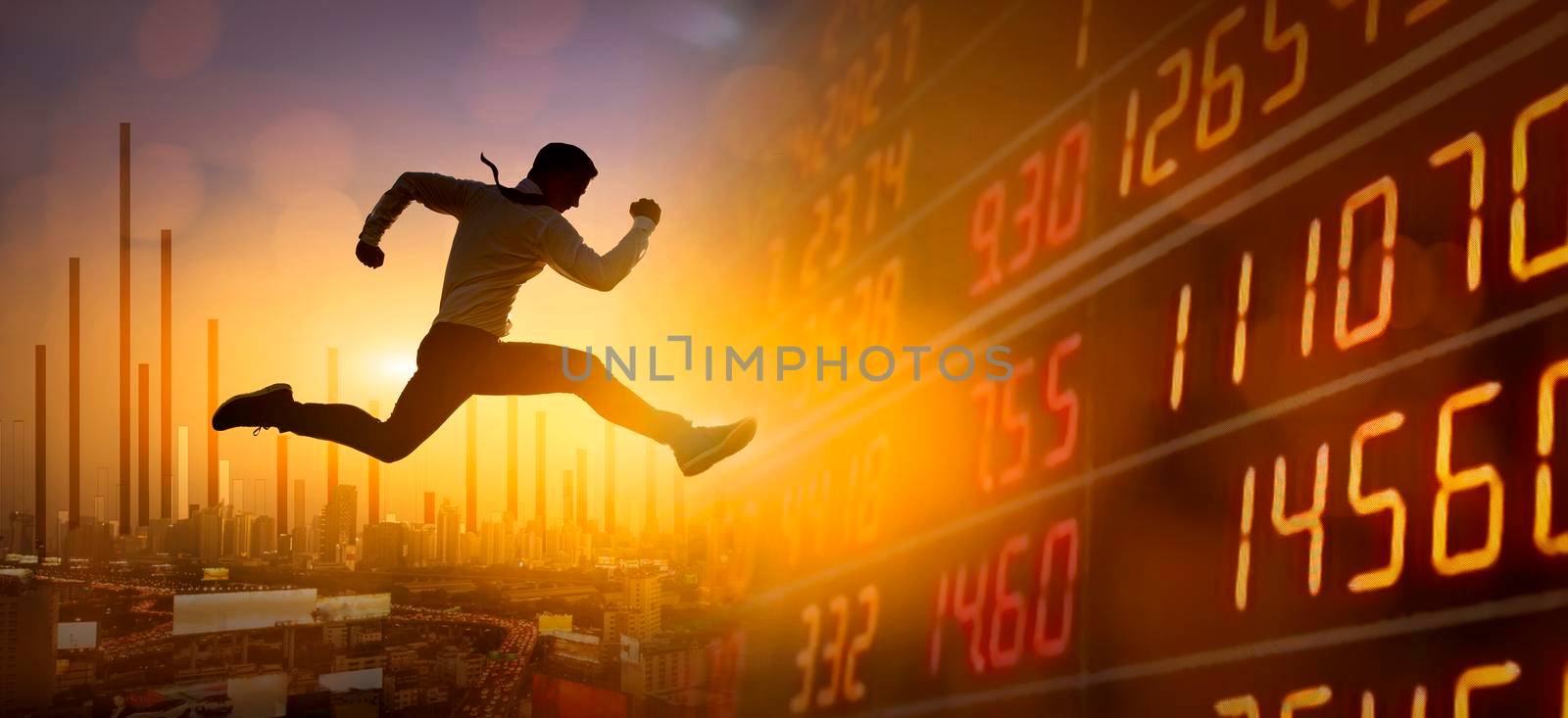 Young businessman  jumping over business graph, Work, job, or successful business concept. Cityscape background.