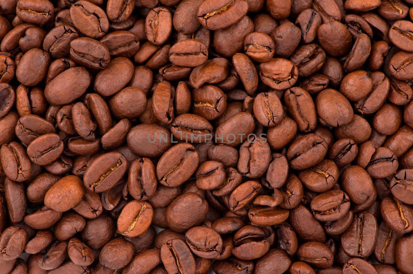 The toasted fragrant grain . Coffee beans texture