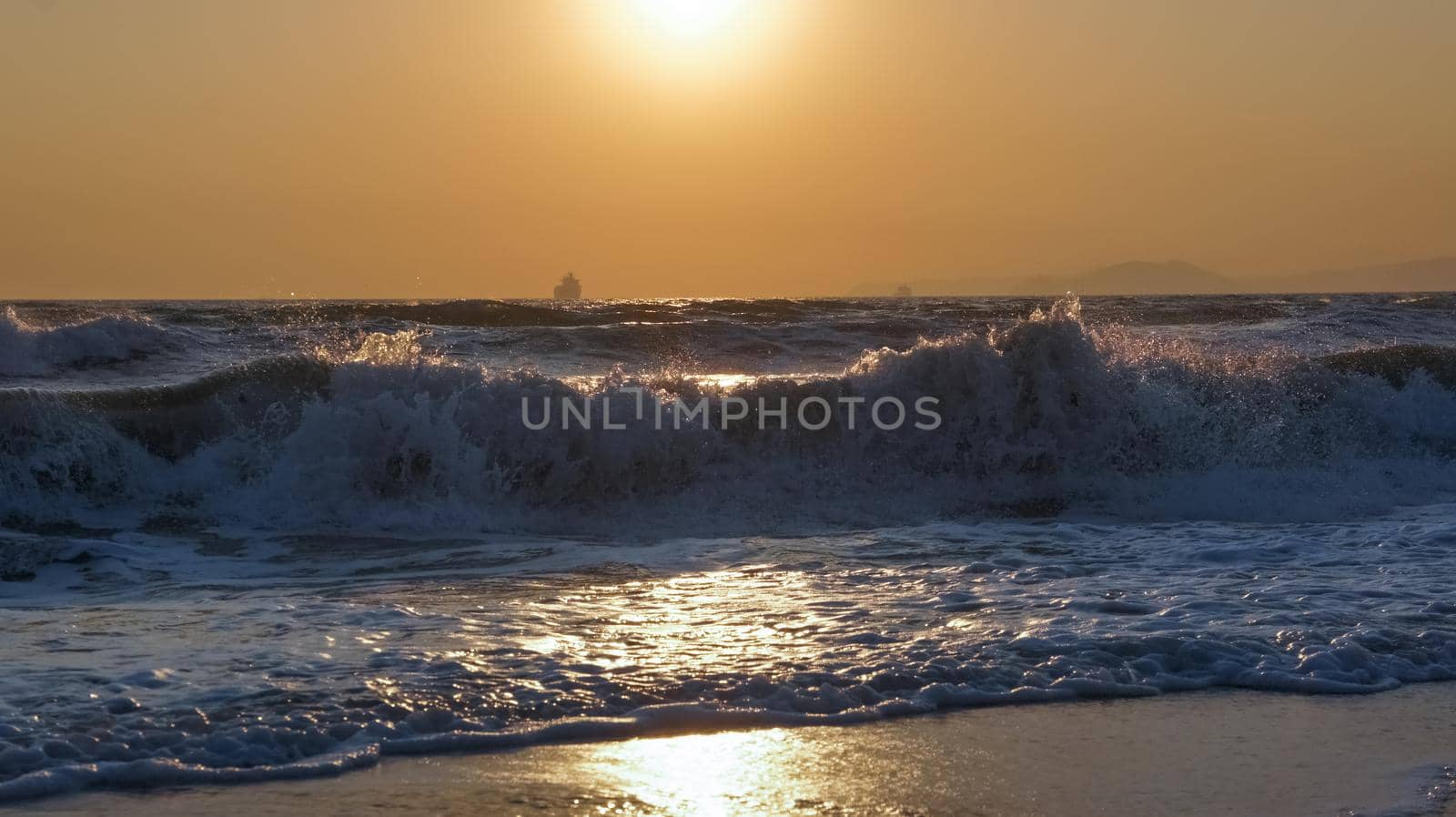 Sunset sea horizon cargo ship silhouette landscape. Cargo ship sunset horizon sea view. Sea sunset cargo ship landscape. Sunset sea cargo ship silhouette view