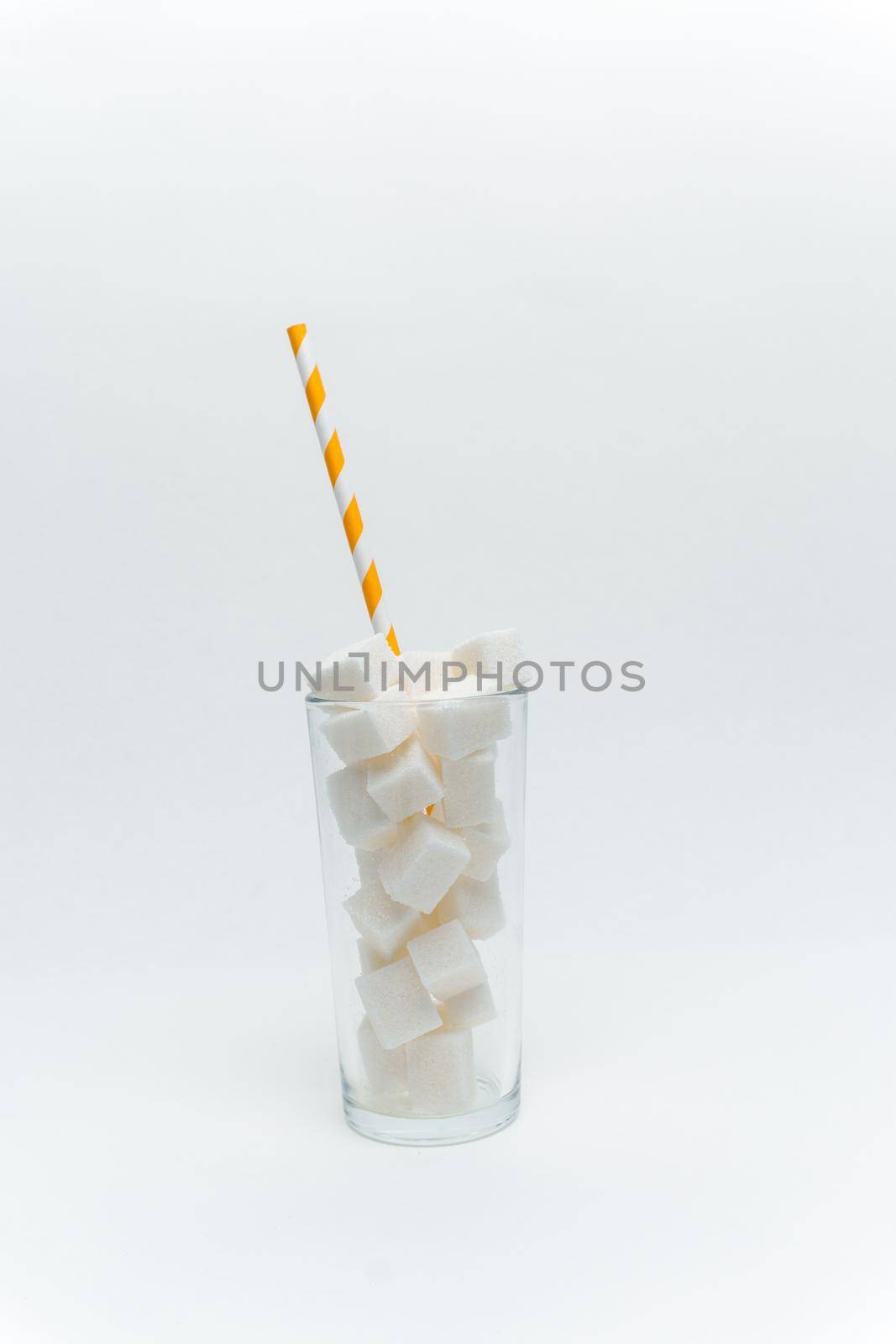 sugar cubes in a glass with a tube high-calorie cocktail by SHOTPRIME