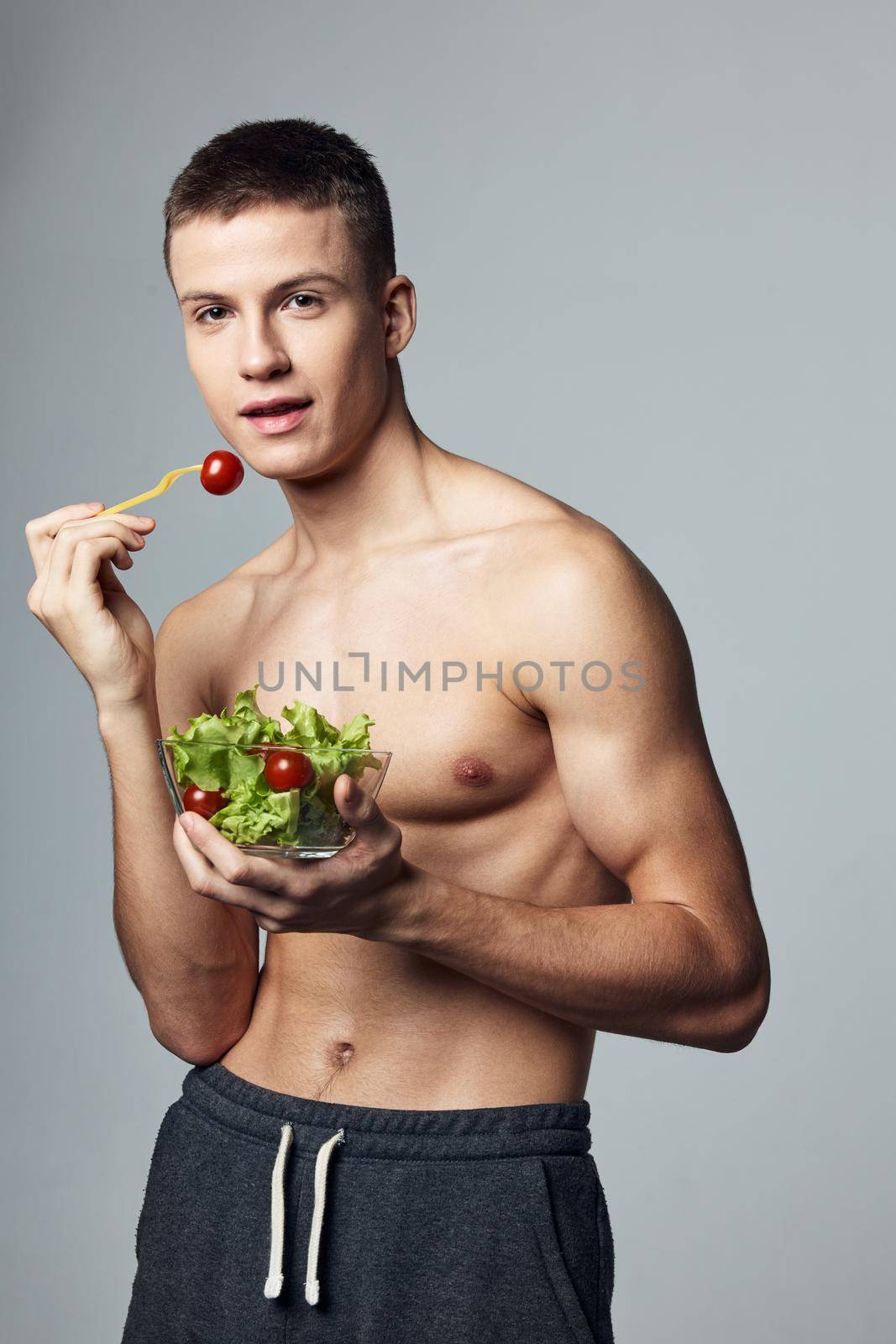 sport man healthy eating cropped view vegetarian isolated background. High quality photo