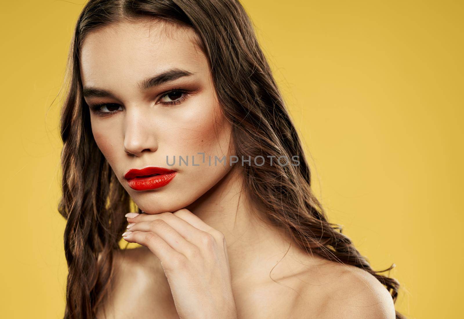 Pretty woman with naked shoulders red lips brunette by SHOTPRIME