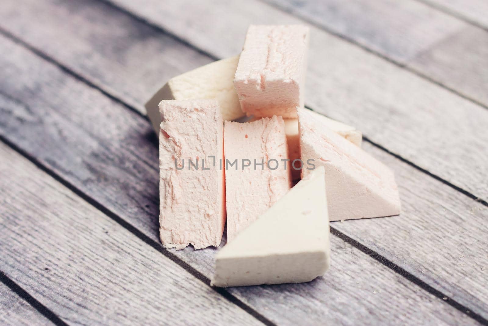 multicolored sweets marmalade snack chocolate delight wooden background. High quality photo