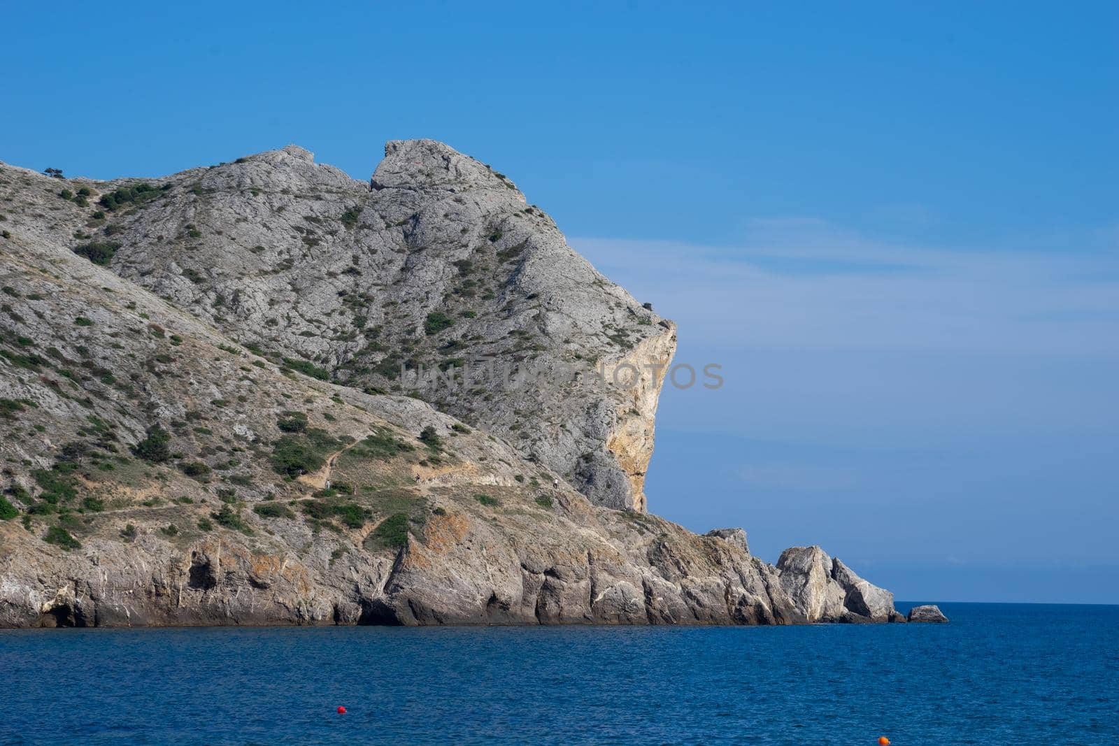 Seascape with a mountain by the sea. Sudak, Crimea