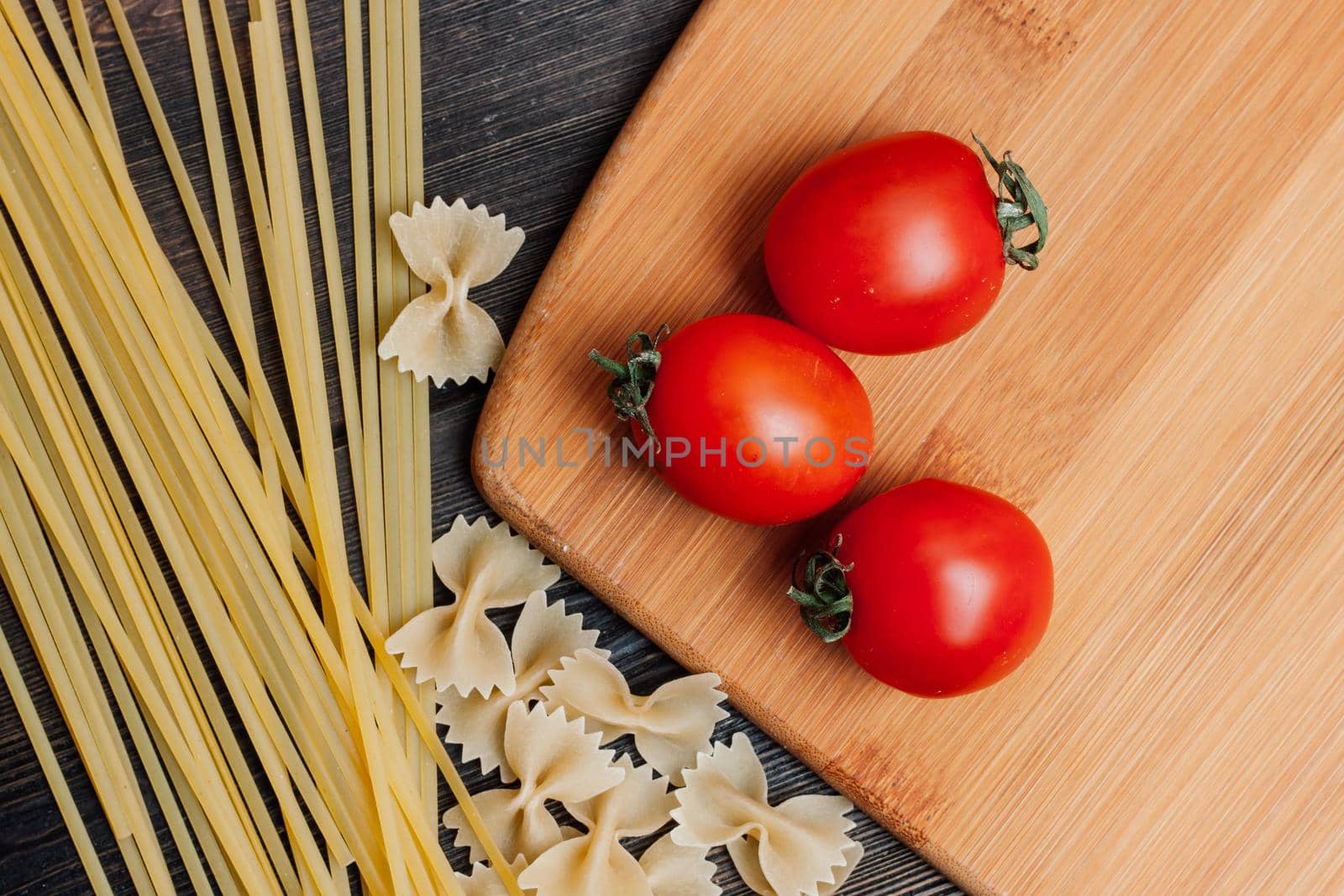 ingredients for making italian pasta cherry tomatoes cuisine. High quality photo