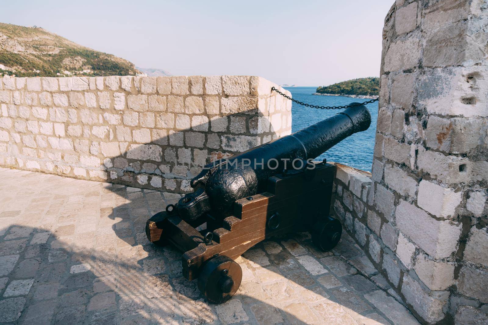 An ancient cannon with kernels on the wall of the old town of Dubrovnik in Croatia