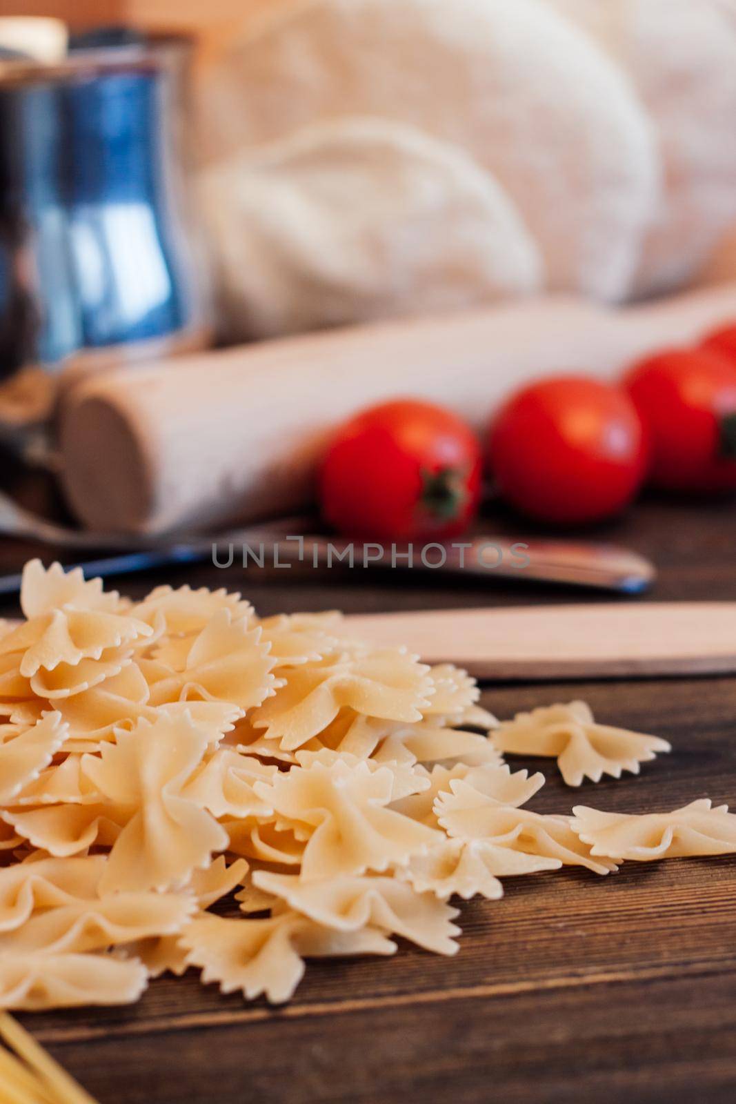 italian pasta cherry tomatoes cooking food kitchen by SHOTPRIME