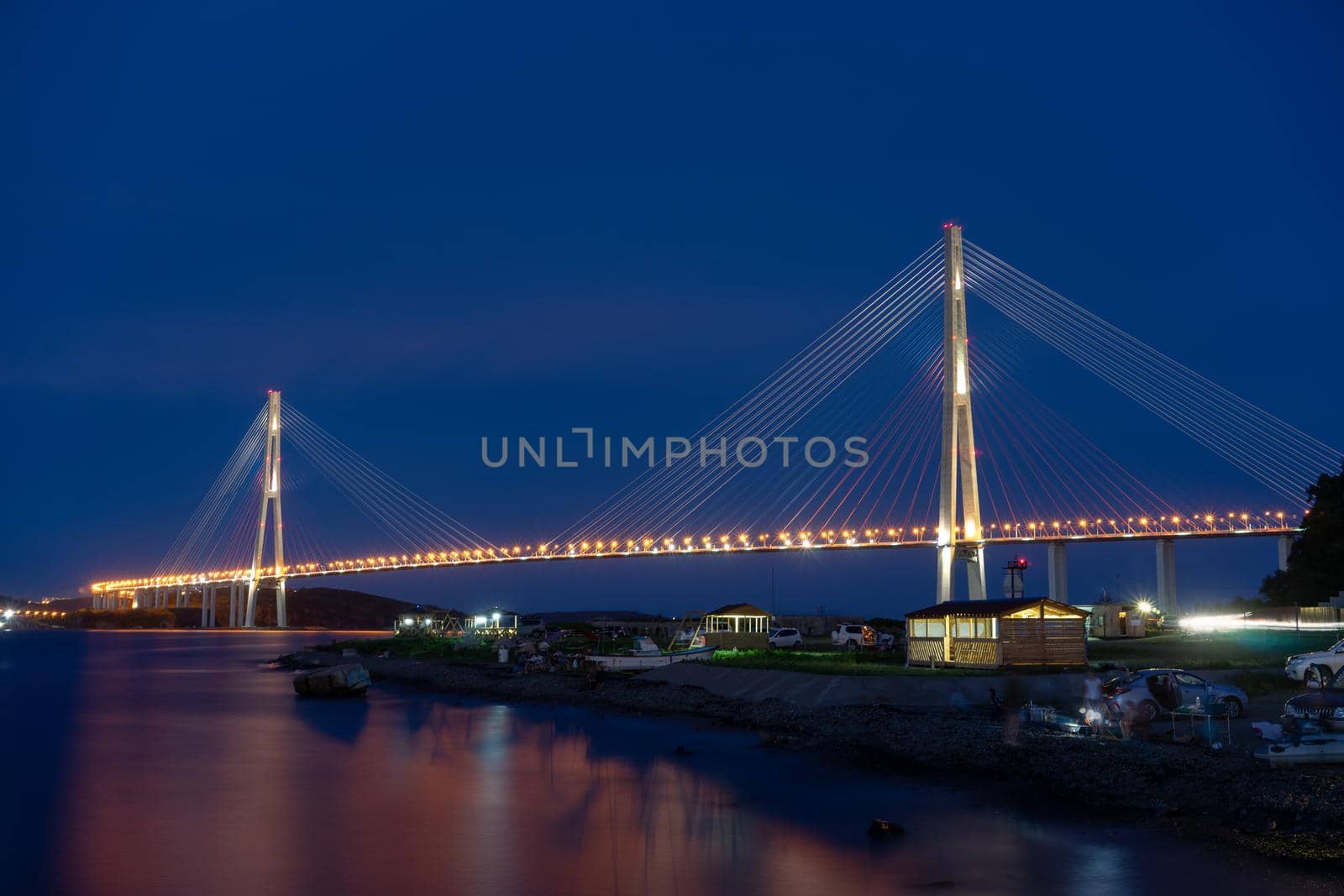 Vladivostok, Russia. Night landscape with views of the Russian bridge. Long exposure photograph.