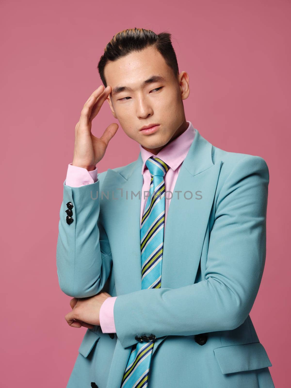 Business man official confident cropped view blue jacket pink background. High quality photo