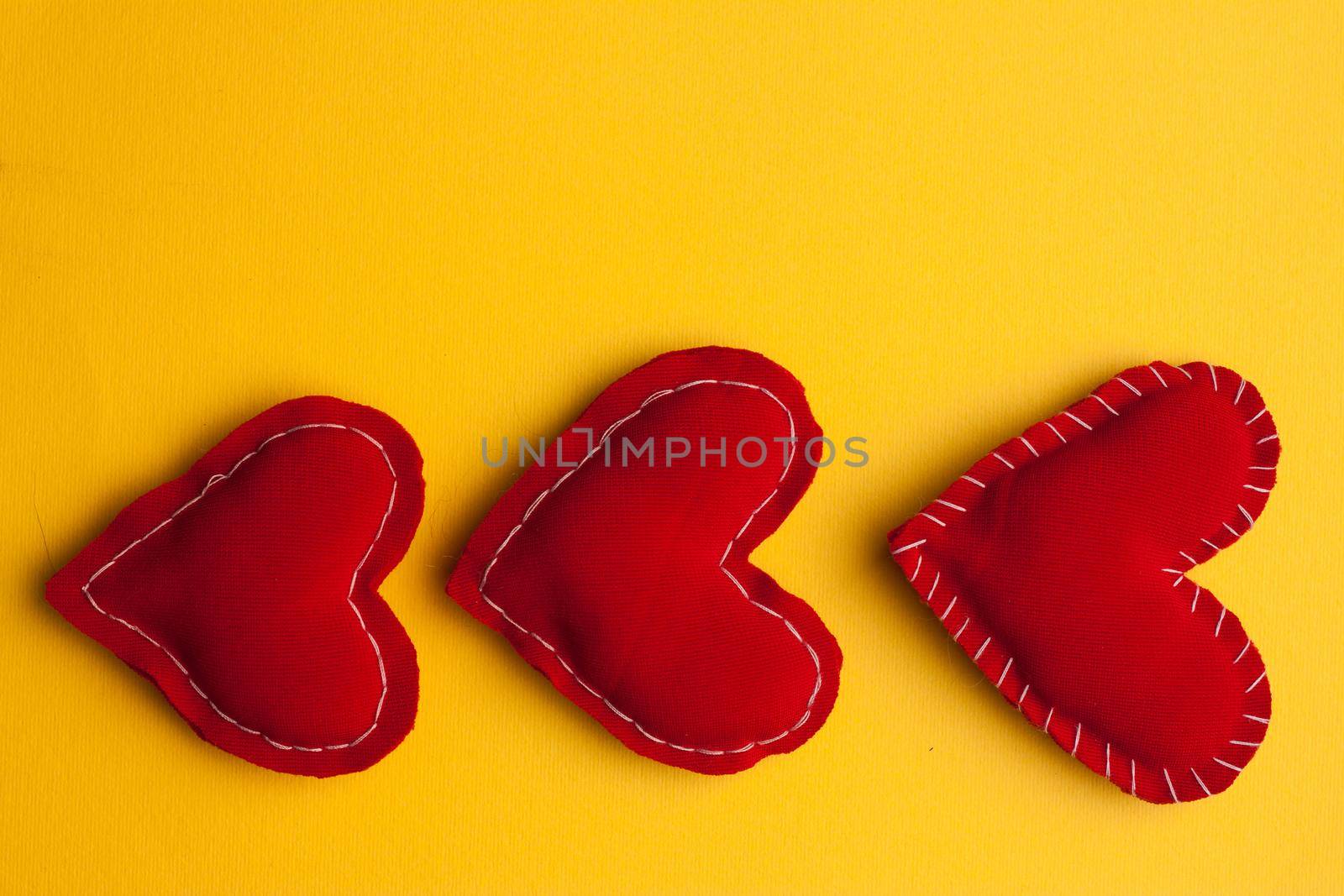 heart gift romance Valentine yellow background decoration. High quality photo