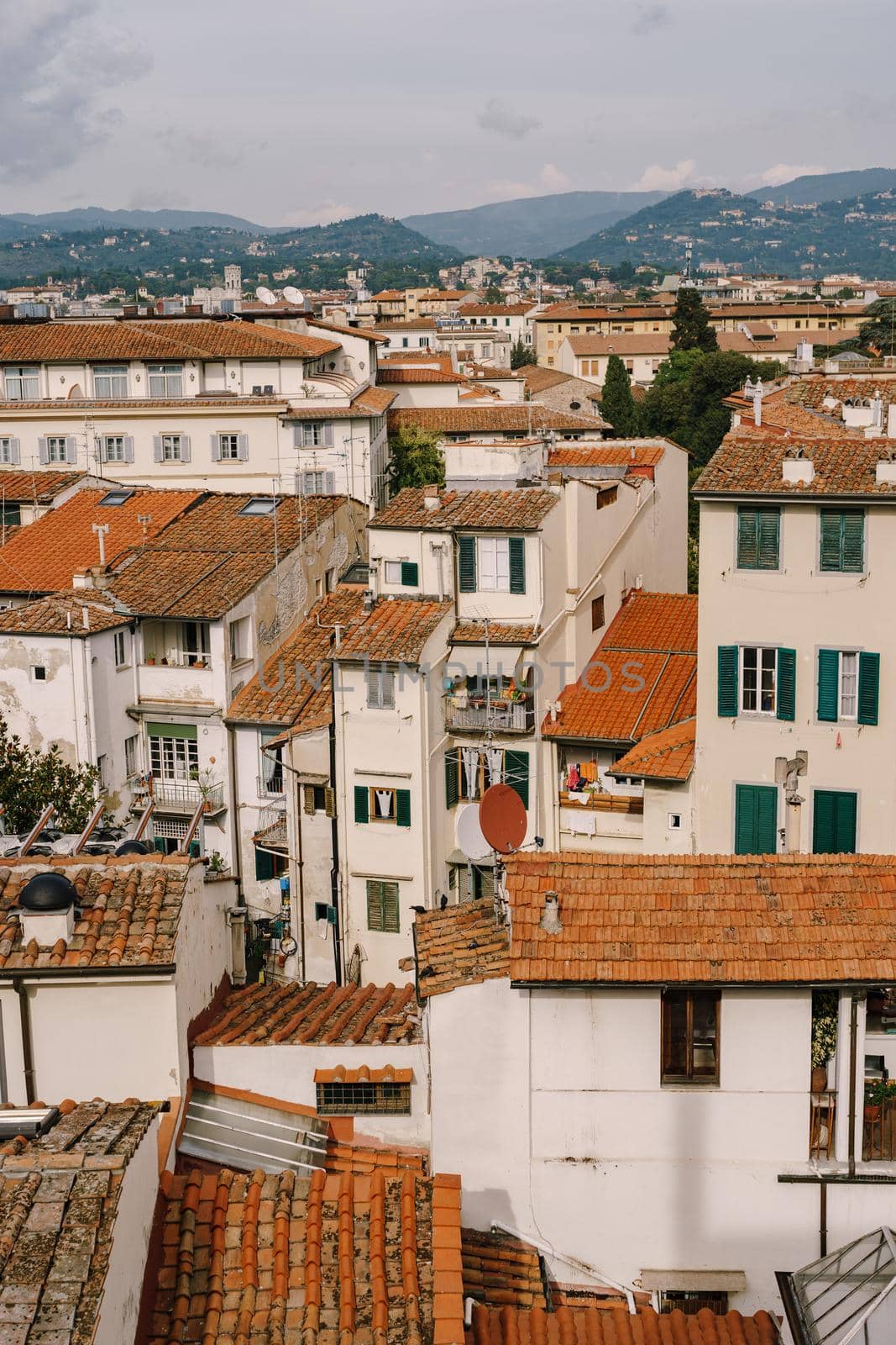 A view from above on rooftops and buildings in Florence, Italy.