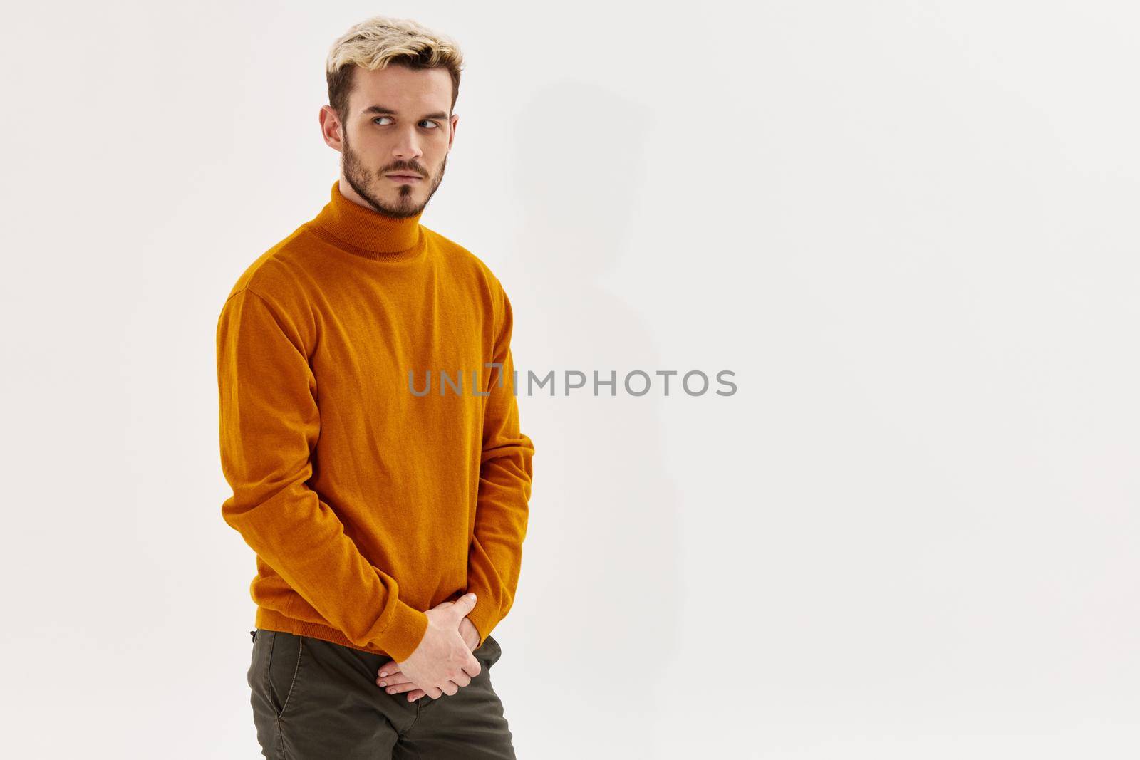 man with fashionable hairstyle brown filter lipstick modern style Copy Space. High quality photo