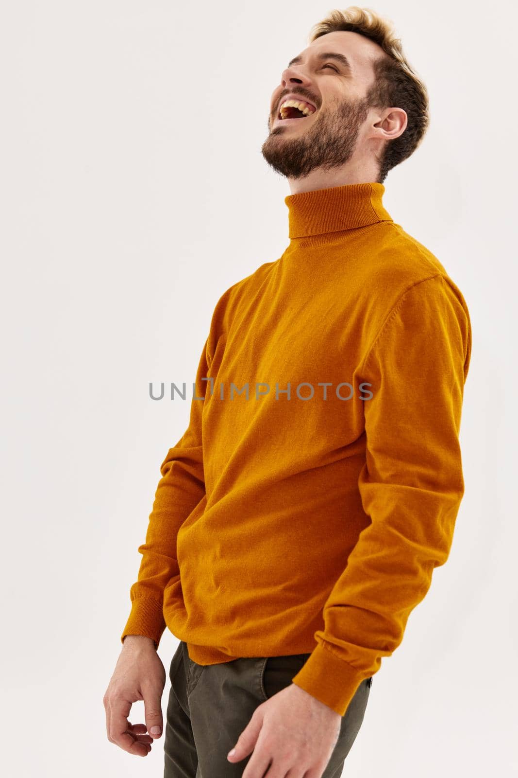 Cheerful man in autumn clothes fashion modern style cropped view. High quality photo