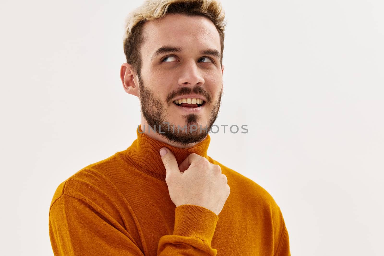 man look to the side close-up isolated background. High quality photo