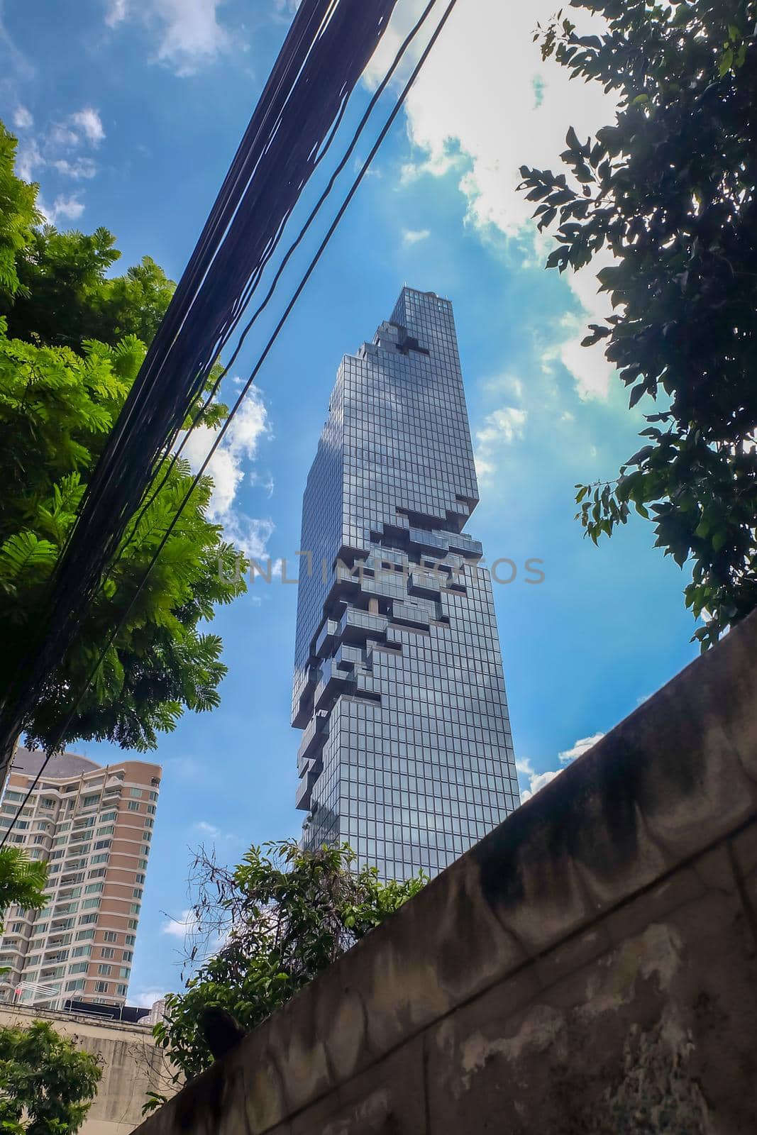 Bangkok, Thailand - July 10, 2019: Looking up at The King Power Mahanakhon skyscraper. The tallest building in Thailand. No focus, specifically.