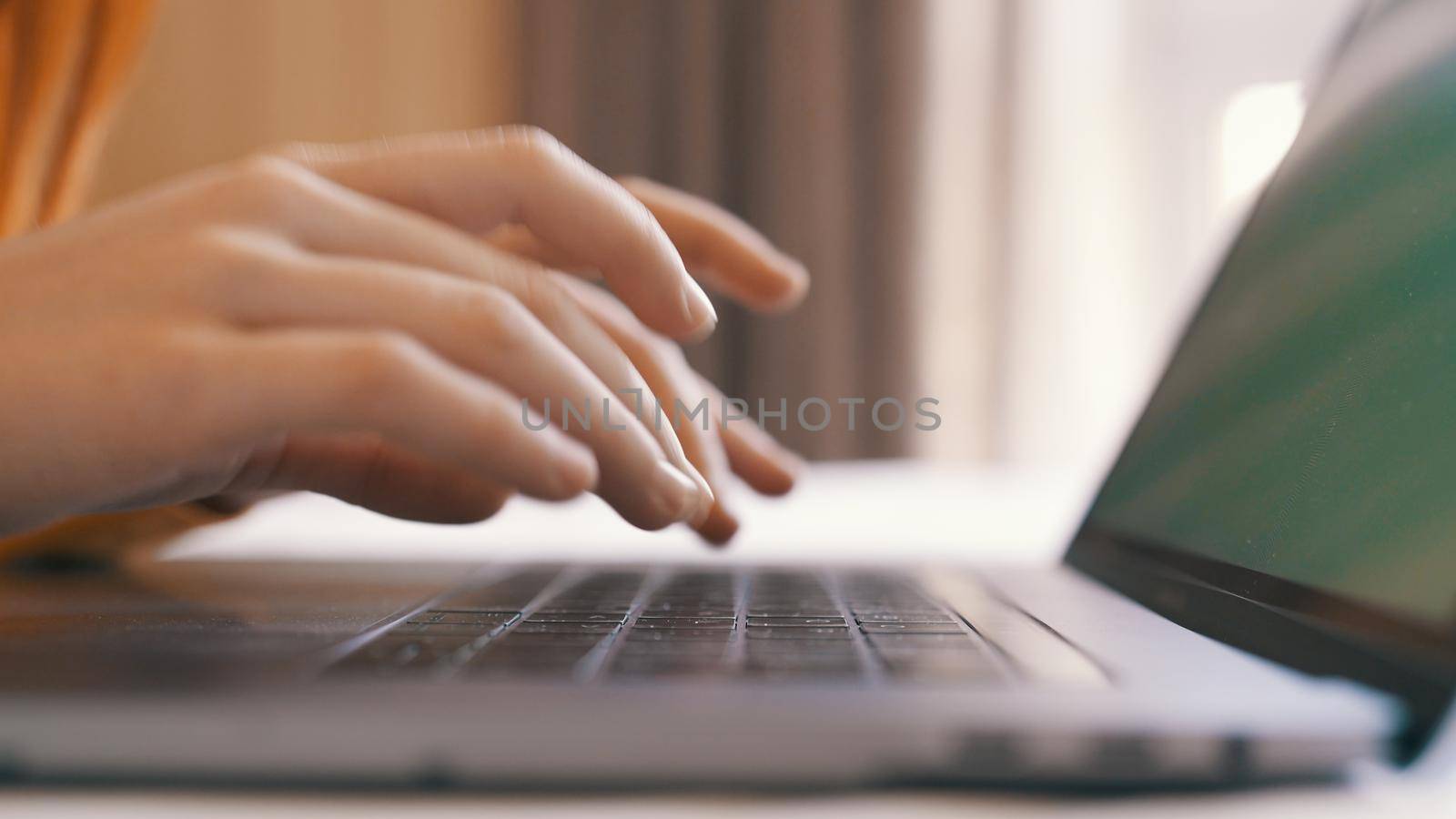 typing on laptop keyboard internet close-up work communication. High quality photo