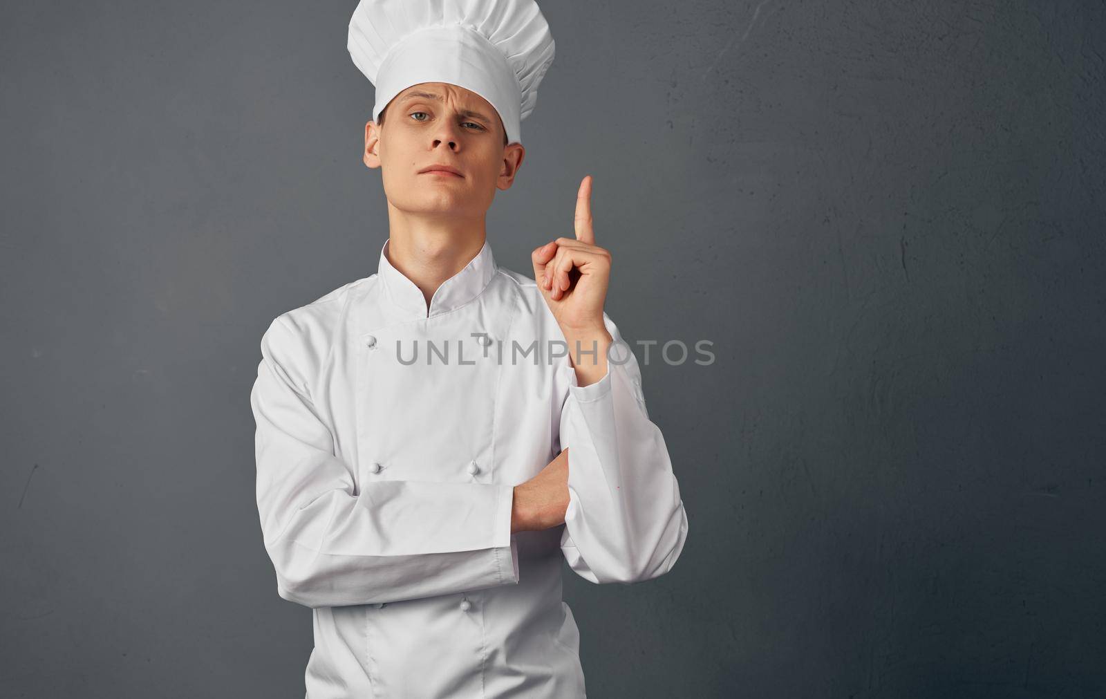 male chef cooking food hand gestures restaurant food preparation service. High quality photo