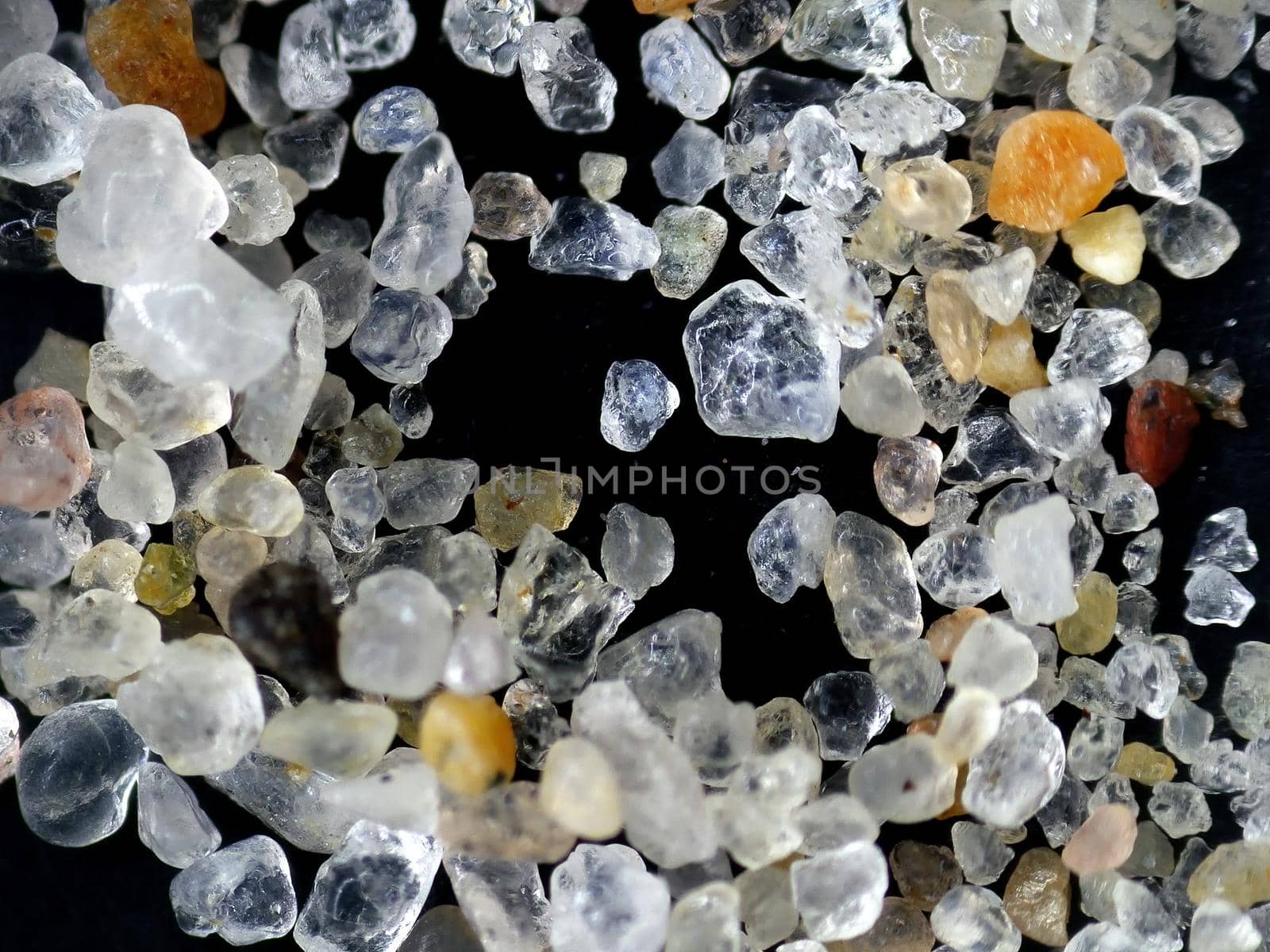 grains of sand under a microscope by Jochen