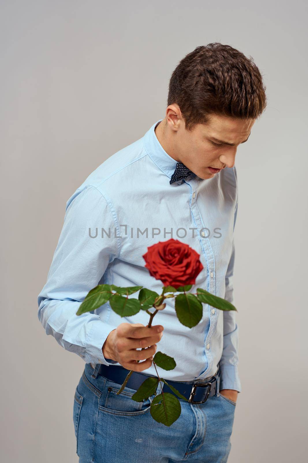 man holding a rose dating waiting dating lifestyle. High quality photo