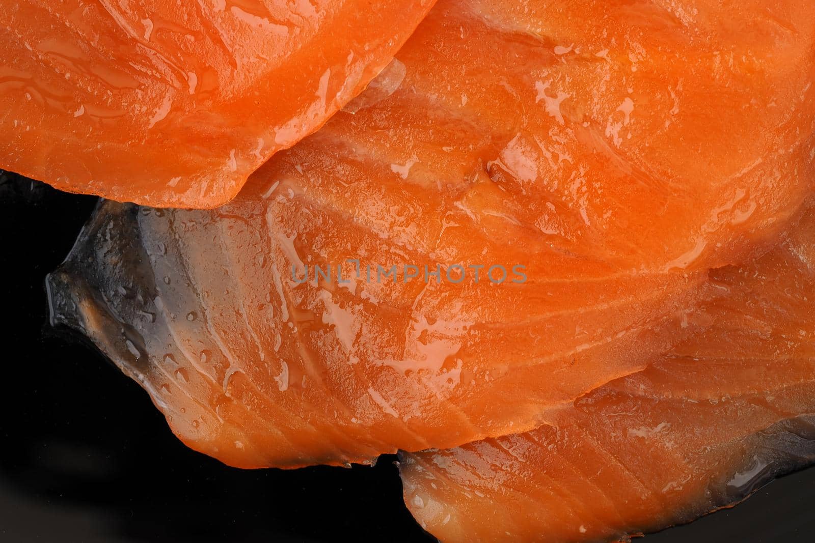 Salmon. Slices of red salted fish on a flat plate. High quality photo