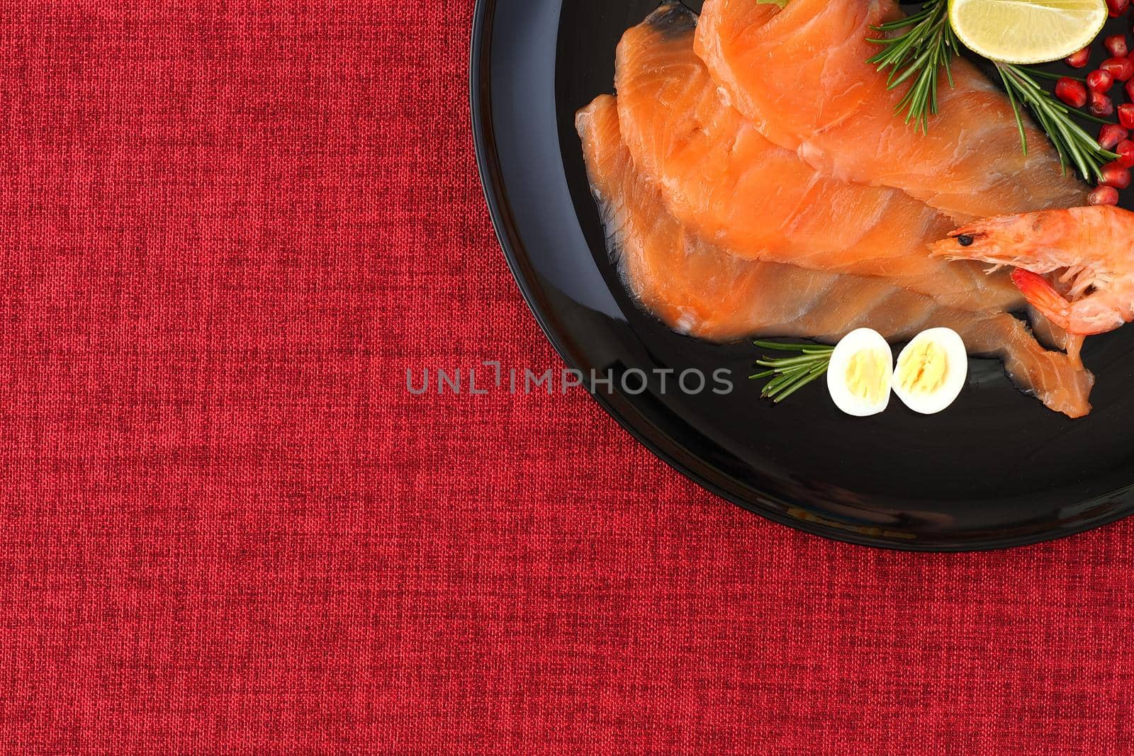 Salmon. Slices of red salted fish on a flat plate. High quality photo