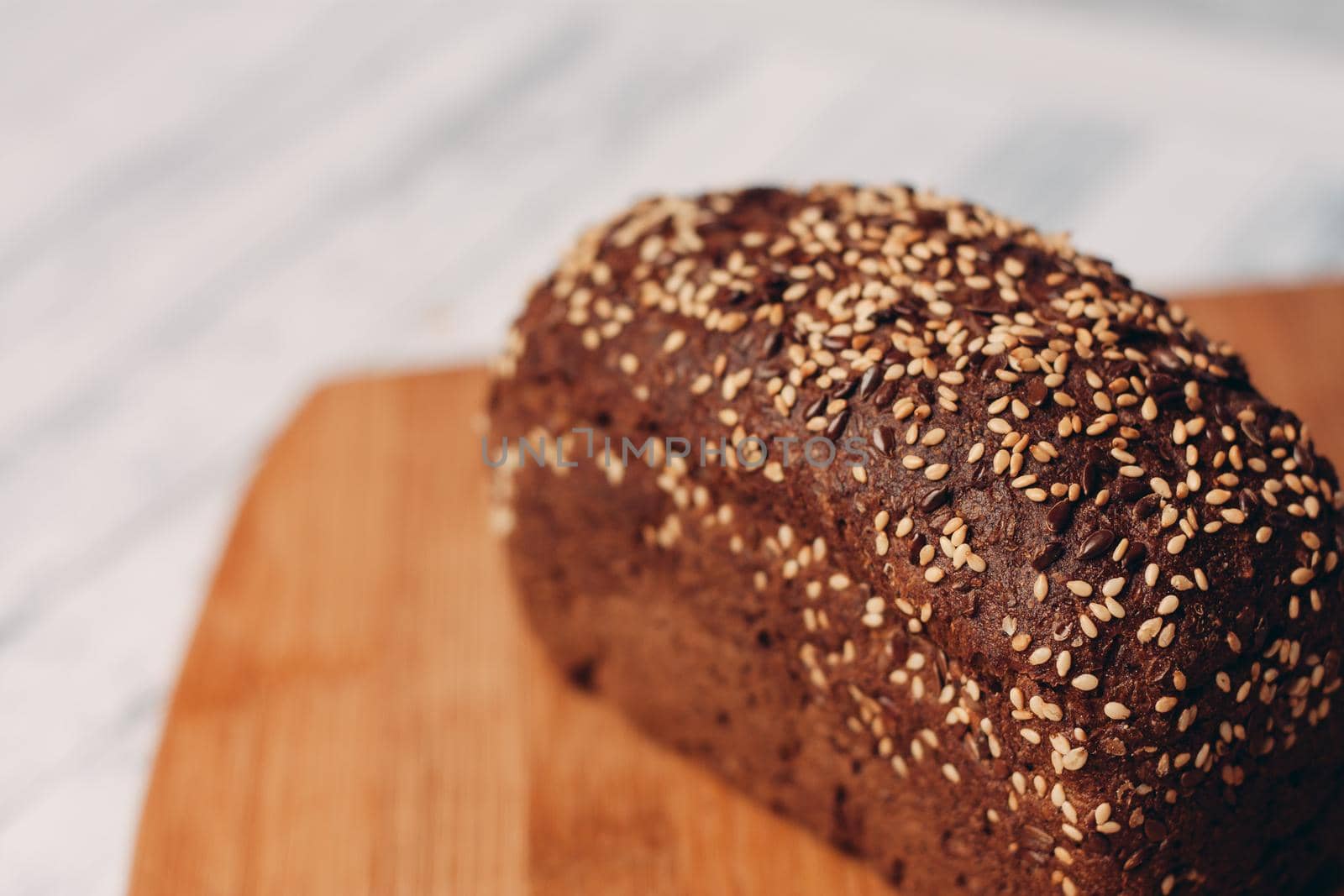 rye whole grain bread cooking home baking wood board. High quality photo