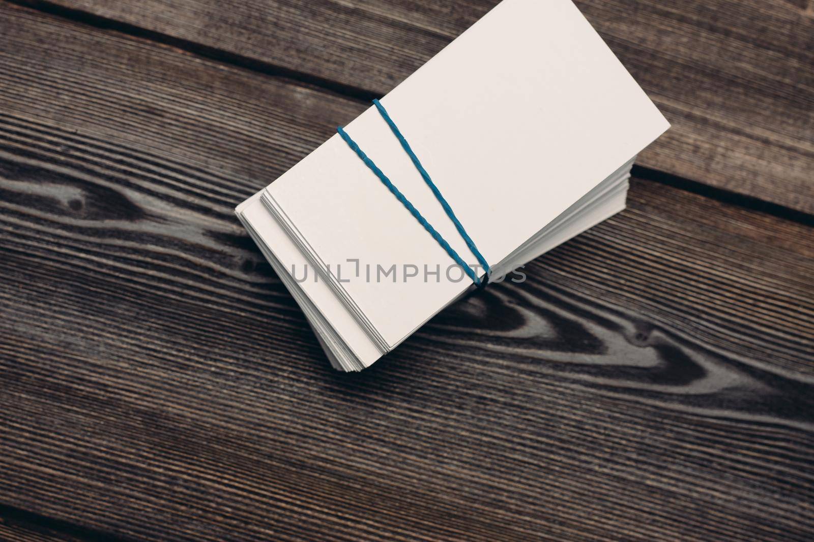 business cards on a wooden table finance office work Copy Space. High quality photo