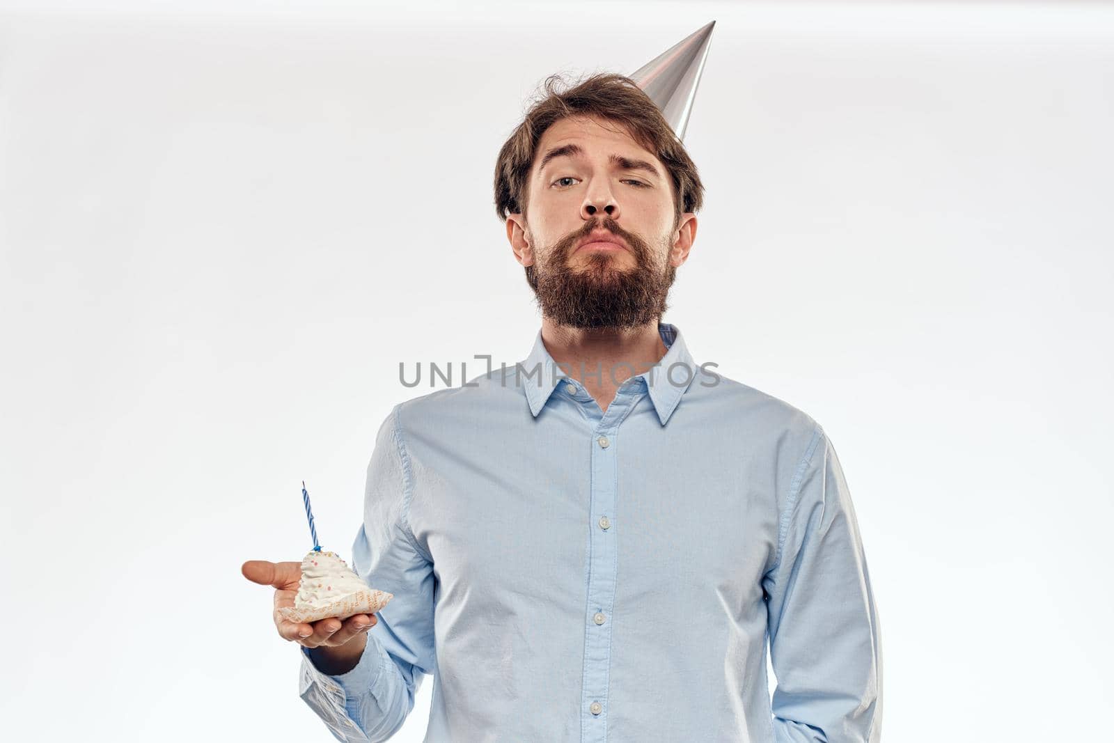 Happy guy with birthday cake white background Compact corporate party cropped beard view. High quality photo