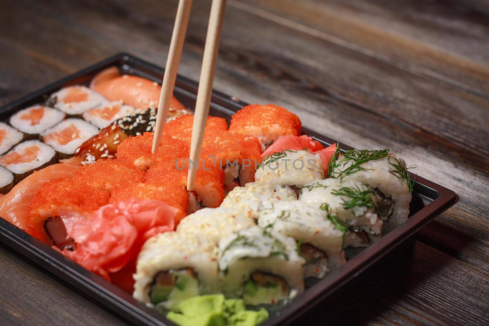 sushi set chopsticks meal japanese food delicacy. High quality photo