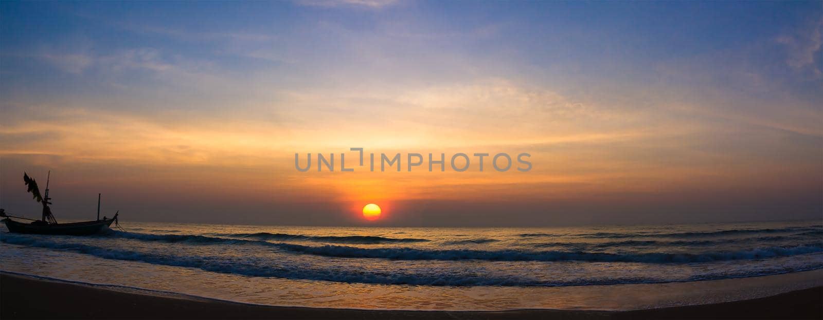 Colorful panorama sky during sunset in the twighligth sky over sea at seashore