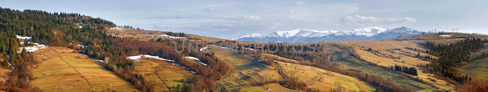 Beauty of nature. Panorama of snow-capped peaks of Carpathian Mountains, Ukraine, Europe. 