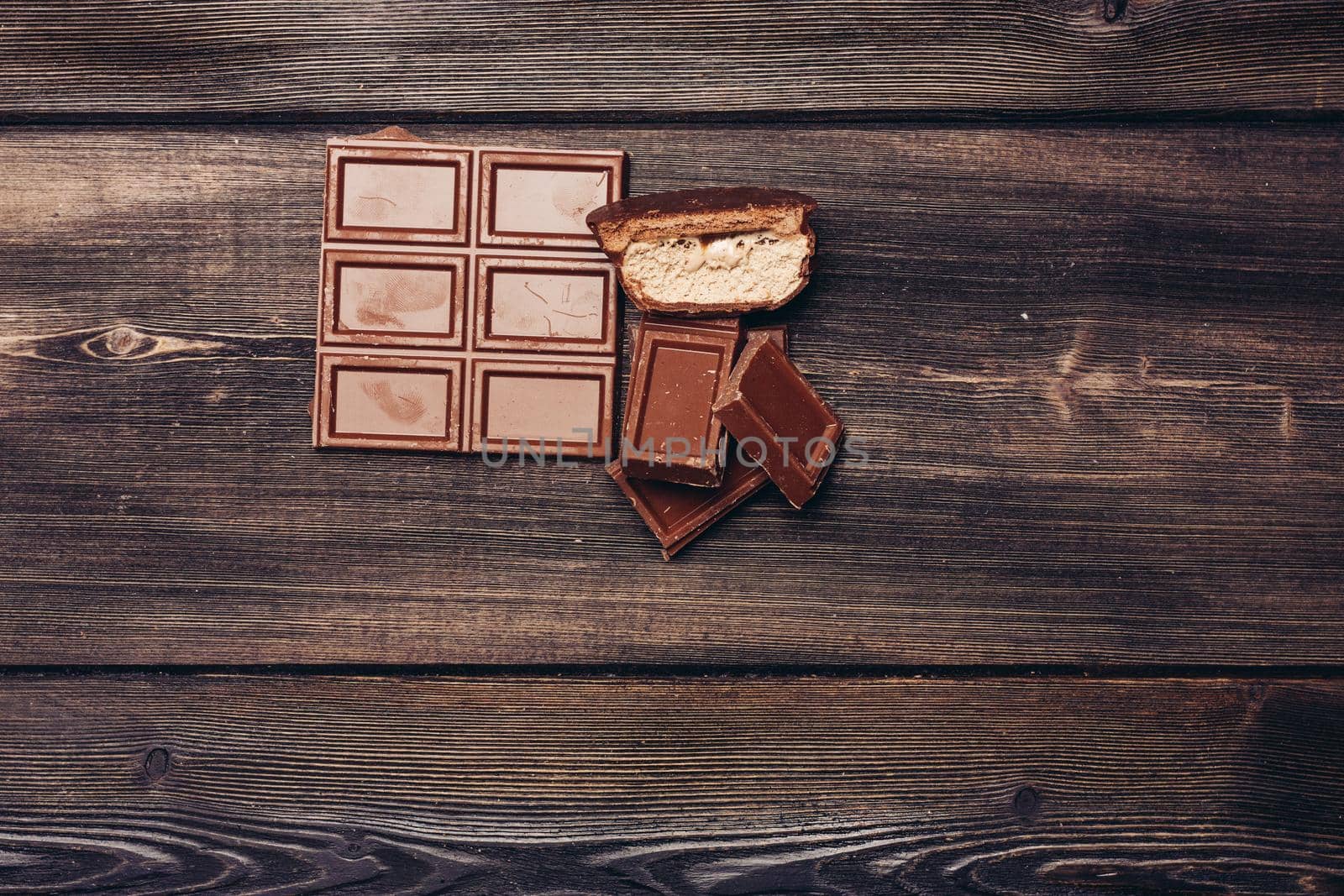 chocolate sweets restaurant cocoa candy wooden background. High quality photo