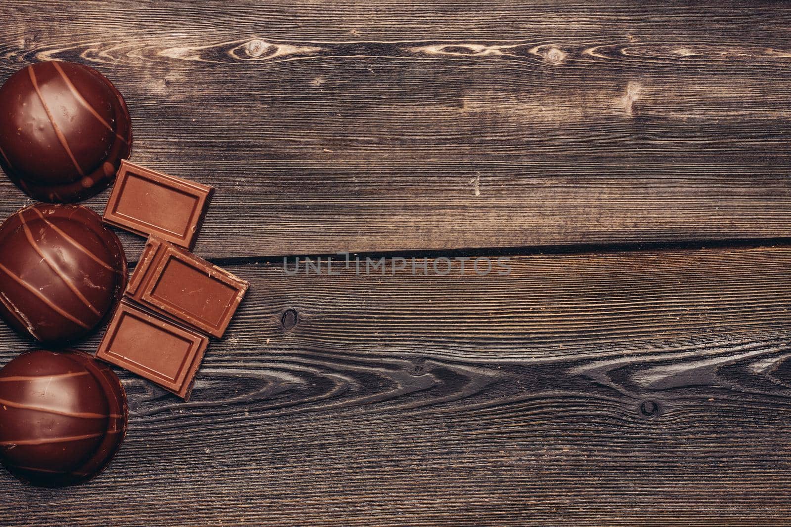 sweets pastries chocolate bar on wooden table background image. High quality photo