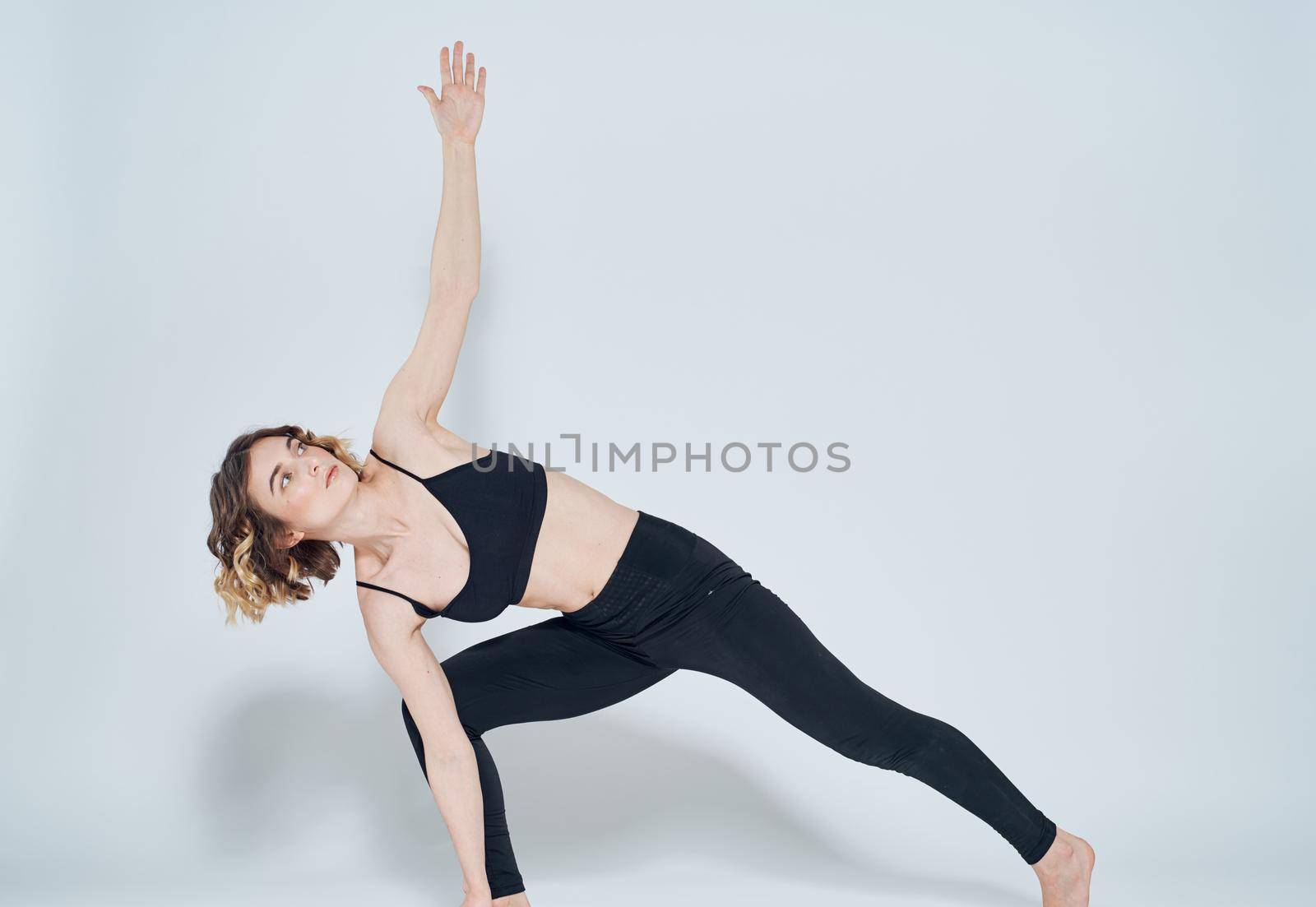 Yoga lunges forward right leg woman sport gymnastics by SHOTPRIME