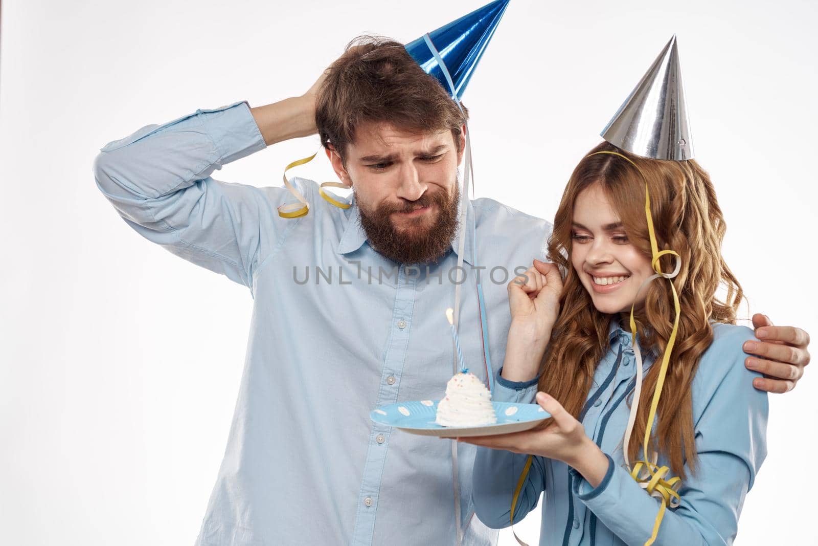 birthday party disco young people with cake and columns fun cropped view close-up. High quality photo