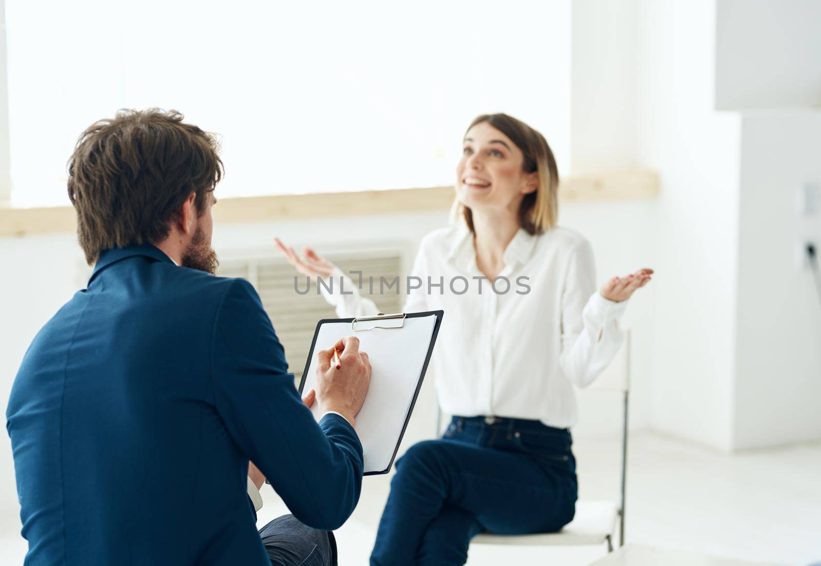 Woman at the reception of a psychologist consultation communication depression. High quality photo