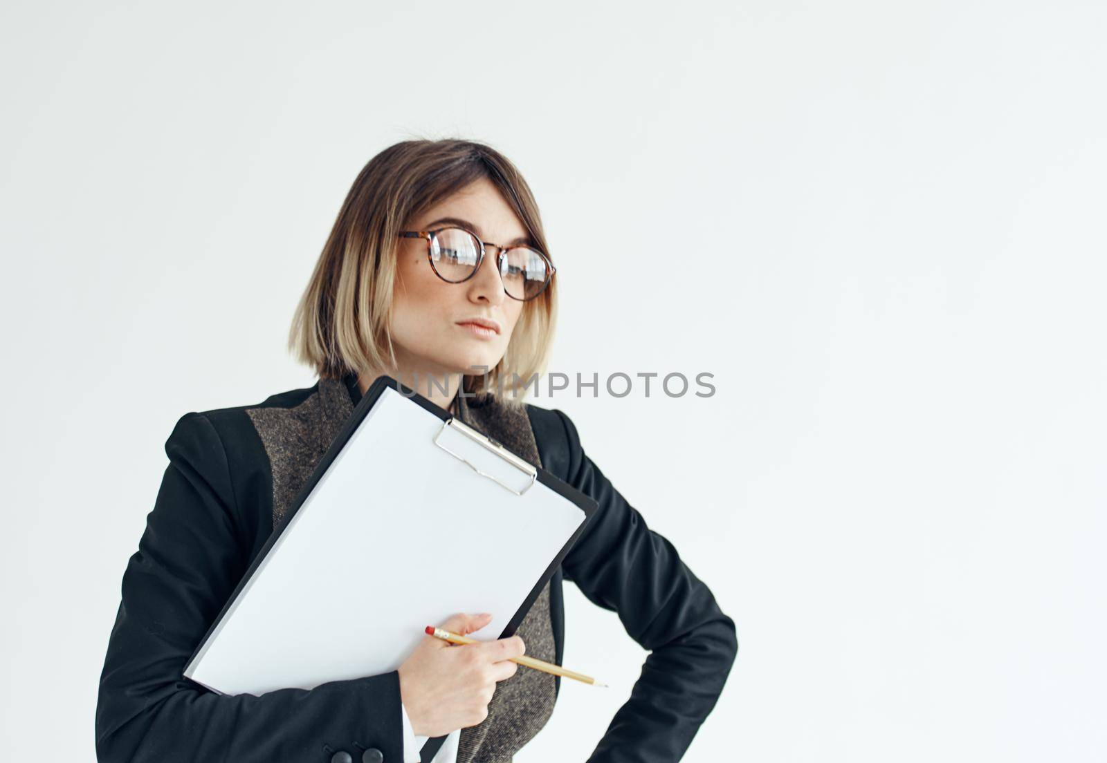 Woman download with documents in hands on a light background. High quality photo