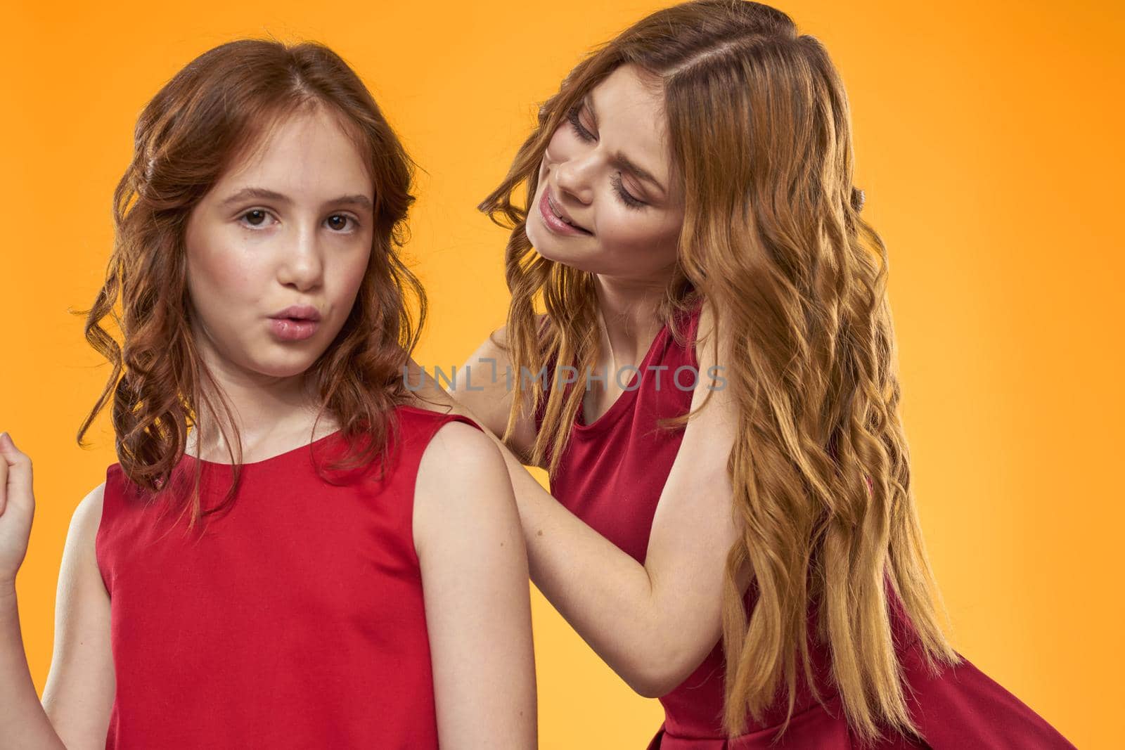 Family fun friendship emotions lifestyle yellow background. High quality photo